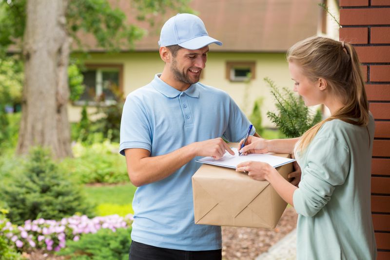 A customer receiving a delivery at home