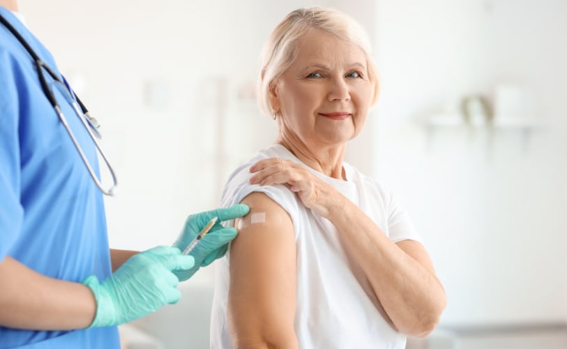 A patient receiving an immunization